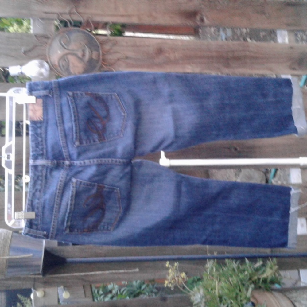 Women's plastic denim size 11-12 blue good condition but distress
